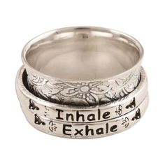 A broad sterling silver band engraved with delicate flowers and leaves is the base for this inspirational meditation ring from India's Shivani Choudhary. Two slender bands inscribed with lotus blossoms and the words inhale and exhale spin freely and serve as a gentle reminder to aspire to a calmer more peaceful frame of mind. Spinner Rings Womens, Unique Silver Rings, Spinning Rings, Meditation Rings, Lotus Blossom, Spinner Rings, Just Breathe, Delicate Flower, Sterling Silver Bands