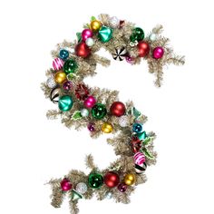 the letter s is made up of christmas balls and tinsels with bells on them