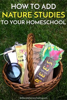 a basket filled with books and other items sitting on the grass, text reads how to add nature studies to your homeschool