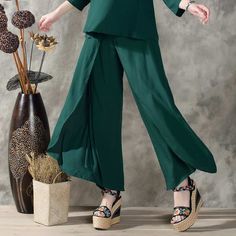 Fit Type: LoosePant Style: Wide Leg PantsFront Style: FlatWaist Type: MidFabric Type: BroadclothMaterial: Cotton, LinenLength: Ankle-Length PantsClosure Type: Elastic Waist SKU: 1475000 Baggy High-waisted Summer Dress Pants, Non-stretch Spring Dress Pants, Spring Non-stretch Ankle-length Culottes, Casual Full-length Culottes, Casual Full Length Culottes, Solid Rayon Bottoms For Spring, Spring Green Loose Fit Wide Leg Pants, Spring Green Baggy Wide Leg Pants, Relaxed Fit Full Length Dress Pants For Spring