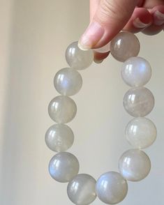 Material:moonstone beads size :Approx 17mm   quantity: one strand  6mm approx 29 pcs one strands 7mm approx25 pcs one strands 8mm approx 22 pcs one strands 9mm approx 21pcs one strands 10mm approx 19 pcs one strands 11mm approx 18pcs one strands 12mm approx 16 pcs one strands 13mm approx 16 pcs one strands 14mm approx 15 pcs one strands 15mm approx 14pcs one strands 16mm approx 14 pcs one strands 17mm approx 13pcs one strands 18mm approx 13pcs one strands 19mm approx 12pcs one strands 20mm appro Moonstone Crystal Bracelet With Round Beads As Gift, White Moonstone Round Crystal Bracelet, Moonstone Crystal Bracelet With 8mm Round Beads, Moonstone Crystal Bracelet With Round 8mm Beads, Hand-strung Moonstone Crystal Bracelet, Moonstone Beaded Bracelets For Healing, Hand-strung Moonstone Beaded Bracelets, Hand-strung Round Moonstone Beaded Bracelets, Moonstone Round Beads Jewelry For Healing