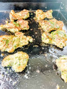 the food is being cooked on the grill in the pan for dinner or to be eaten