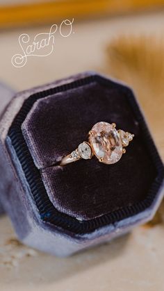 an engagement ring in a velvet box