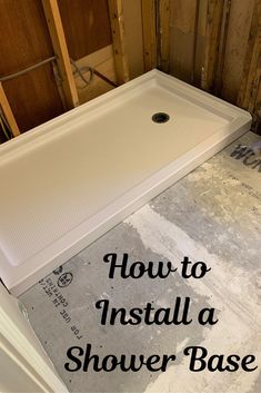 a shower base with the words how to install a shower base