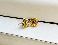 A Vintage 14k Gold Detailed Flower Stud Earrings All items are XRay and Acid tested to ensure metal authenticity. All pieces in this store are solid gold in the purity listed unless otherwise stated.  Weight: 2.6 grams Size: 16.5mm x 11.5mm approximately Flower Stud Earrings, Flower Stud, Flower Earrings Studs, Flower Studs, X Ray, Gold Details, Jewelry Earrings Studs, Solid Gold, Size 16