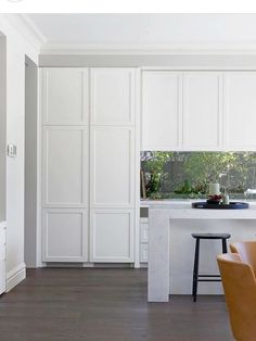 the kitchen is clean and ready to be used as a dining room or office space