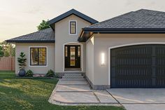 a white house with black garage doors and green grass in the front yard at dusk