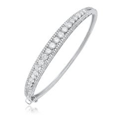 "Each carefully selected cubic zirconia are inserted by hand individually by professional jewelers on pure sterling silver 925. The CZ'S in my jewelry are the highest grade in the world. You will not know that it is not a diamond. Once you buy a ZirconZ CZ, you will only want this quality. Well Made With Signity Cubic Zirconia's And Filligree On The Inside Backing. Just Like Real Gold And Diamond Bracelets. Please email me for other colors. All other colors are in production. This bracelet is so Luxury Cubic Zirconia Round Bangle, Silver Cubic Zirconia Bangle With Pave Setting, Sparkling Cubic Zirconia Diamond Bangle, Cubic Zirconia Multi-stone Bangle, White Diamond-cut Cubic Zirconia Bangle, Fancy Boxes, Bracelets Gold Diamond, Diamond Bracelets, Real Gold