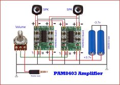 an electronic device with two speakers attached to it and some wires connected to each other