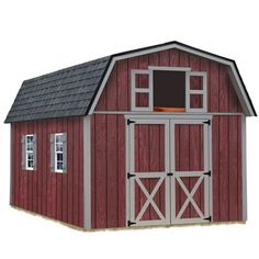 a red and white barn with a window on the top floor next to a door