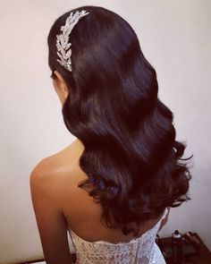 the back of a woman's head wearing a tiara