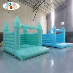 an inflatable bouncer set up inside a warehouse