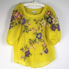 Sundance Catalog Blooming Arbor Lemon Yellow Floral Embroidery Top New With The Tag Size: S Material: 100% Ramie Embroidery: 100% Polyester Care: Hand Wash Inside Out Pullover Scoop Neckline With Elastic Stretch Shoulders Elbow Sleeves With Elastic Cuffs Scoop Hemline New With The Tag, Never Worn! Approx. Measurements: Across The Underarms: 19.5" Sleeve Length From Shoulder Seam: 16.5" Length Down The Center Back: 22.5" Embroidered Yellow Summer Blouse, Yellow Embroidered Summer Blouse, Bohemian Yellow Tops With Floral Embroidery, Yellow Bohemian Tops With Floral Embroidery, Embroidered Yellow Blouse For Summer, Traditional Yellow Blouse For Spring, Spring Yellow Blouse With Floral Embroidery, Bohemian Yellow Blouse With Floral Embroidery, Yellow Blouse With Floral Embroidery For Spring