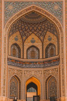 the entrance to an ornately decorated building