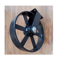 an image of a wheel on the floor with no wheels or spokes in it