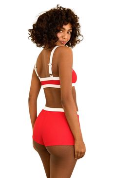 The Farrah Short brings style and comfort without skimping on fun. With its elastic waist, these shorts are the perfect fit for any adventure. 82% Polyester 18% Spandex Made in Vietnam Booty short coverage Elastic waist Hand Wash Red Athleisure Swimwear For Summer, Red Sporty Swimwear For Spring, Sporty Red Short-length Swimwear, Sporty Red Bottoms For Vacation, Red Sporty Shorts For Poolside, Sporty Red Shorts For Poolside, Sporty Red Bottoms For Poolside, Red Athleisure Shorts For Beach, Red Athleisure Shorts For The Beach