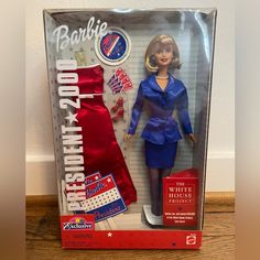 the barbie doll is in its original box