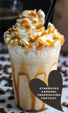 starbucks caramel frappuccino copycat is on the table with coffee beans