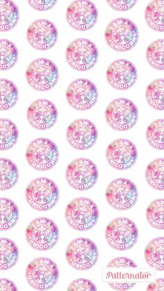 the pattern is made up of pink and blue circles with white letters on them,