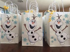 three bags with frozen snow characters on them