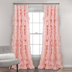 the curtains in this room have ruffles on them