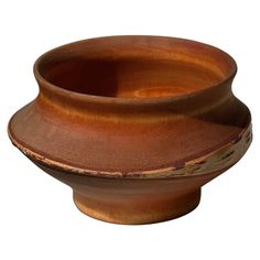 a wooden bowl is shown on a white background