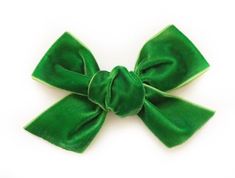 Bow measures approximately 4 inches and is made of high quality kelly green velvet ribbon Attached to your clip of choice (single or double prong alligator clip) that's been partially lined with matching grosgrain ribbon or a nylon headband in your choice of color Nylon headbands fit newborns up to adults All ribbon has been heat sealed in order to prevent fraying Green Ribbon Girl, Green Bow Png, Classic Green Bow, Green Bow Hair Clip, Velvet Bow Hair Clip, Rainbow Bow, Green Bows, Fabric Bows, Velvet Bow