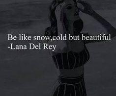 a woman is standing in the water with her hand on her head and she has a quote above her that says, be like snow, cold but beautiful - lana del ray