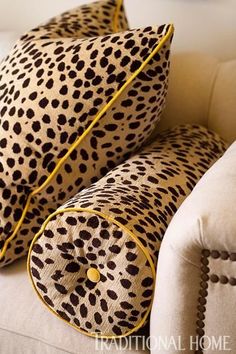 two pillows with black and white spots on them