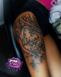 a woman's arm with a clock and flowers tattoo on it next to a purple object