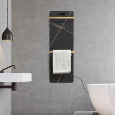 a bathroom with a sink, mirror and towel rack on the wall next to a bathtub