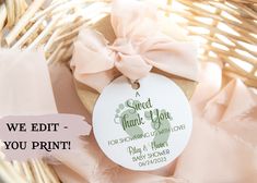 a basket filled with baby shower items next to a tag that says, we editt you print