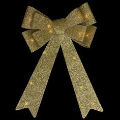 a gold bow with lights on it