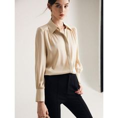 Discover Elegance and Comfort Elevate your wardrobe with our Elegant Long Sleeve Silk Blouse, a perfect blend of luxury and practicality for the modern woman. Designed for all-season wear, this blouse is a testament to timeless style and comfort. Its solid purple hue and chic design make it an ideal choice for a sophisticated office look or a casual day out. Premium Quality Fabric Experience the luxurious touch of our blouse, crafted with a high-quality blend of 90% Mulberry silk and 10% Spandex. This exquisite combination ensures both comfort and durability, offering a slight stretch for the perfect fit. The thin, breathable fabric makes it suitable for any season, providing a seamless blend of warmth and coolness. Key Features Fabric Content: 91% to 95% natural fiber, ensuring a gentle f Beige Long Sleeve Office Blouse, Elegant Semi-formal Tops With Lapel Collar, Beige Long Sleeve Blouse For Work, Chic Long Sleeve Beige Shirt, Beige Blouse For Business Casual In Fall, Chic Beige Long Sleeve Shirt, Fall Business Casual Beige Blouse, Timeless Fitted Blouse For Work, Timeless Office Blouse With Lapel Collar