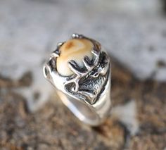 Custom carved, lost wax casting, elk ivory ring. Handcrafted by Staghead Designs. Wax Casting Rings, Lost Wax Casting Rings, Elk Ivory Ring, Elk Ivory Jewelry, Antler Wedding Rings, Antler Wedding Band, Elk Ivory, Tooth Ring, Ivory Ring