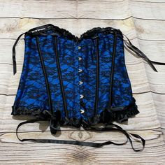 Brand New With Tags Black And Blue Bustier Top Size Large Blue Overbust Corset For Party, Blue Underbust Corset For Summer, Fitted Blue Corset For Night Out, Blue Summer Corset For Night Out, Blue Fitted Strapless Corset, Blue Corset For Summer Night Out, Blue Corset For Night Out, Sleeveless Blue Corset For Night Out, Blue Underbust Corset