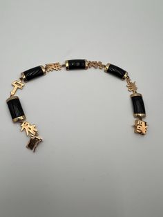 Sterling vermeil and black onyx or glass Asian style link bracelet  In very good condition  Measures 7.5" 2024 Formal Black Gold Bracelet, Gold Onyx Bracelet For Formal Occasions, Asian Style, Chain Link Bracelet, Black Onyx, Link Bracelets, Arm Band, Chain Link, Onyx