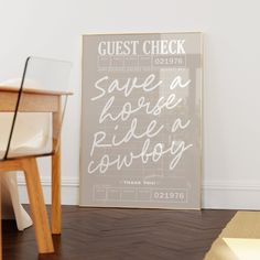 a wedding guest check sheet is on the floor in front of a chair and table