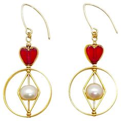 These earrings are light weight. It is composed of German Vintage Glass Beads that are edged with 24K gold. It is incorporated with oval freshwater pearls set in a 24K gold plated brass geometric frame. The vintage glass beads that is framed with 24K gold were hand pressed between 1920s - 1960s. Because of the nature of this jewelry, it is unique. *Our jewelry have maximum protection for anti-tarnish and is made for extended wear. These earrings are handmade and composed of natural items. Due to Geometric Frame, Pearl Set, Geometric Earrings, Ear Wire, Red Heart, Fresh Water, Freshwater Pearls, Gold Filled, Glass Beads