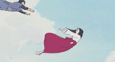 two people are flying in the sky with one person on his back and another woman on her knees