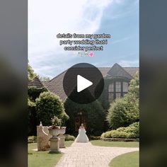 a woman standing in front of a house with a video screen showing her wedding dress