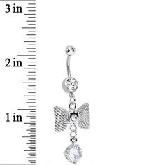 A feminine dangling navel ring takes an already charming silver bow and gives it plenty of dazzle with the addition of clear gems. Embrace formal attire with a girly twist, thanks to this fancy stainless steel belly button ring. Specifications 14 Gauge (1.6mm), 7/16" (11mm), 316L Surgical Grade Stainless Steel, 5mm Ball Dangle Belly Rings For Wedding, Elegant Metal Dangle Belly Rings, Elegant Metal Belly Rings As Gift, Elegant Metal Belly Rings For Gift, Elegant Dangle Belly Rings For Wedding, Elegant Wedding Dangle Belly Rings, Elegant Adjustable Dangle Belly Rings, Silver Bow Tie, Conch Piercing Jewelry