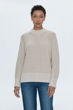 Mockneck longsleeve sweater with wide ribbed cuffs and collar. Crafted from a marled, waffle knit with directional knitting and dropped shoulders for a relaxed fit and transitional wearability. Dove is a neutral hue with cool undertones. 100% Cotton Imported Mockneck Longsleeve, Perfect White Tee, Best Swimwear, Knit Outerwear, Cool Undertones, Knit Bottom, Loungewear Jumpsuit, Denim Maxi Skirt, Heather White