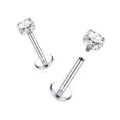 PRICES MAY VARY. Cartilage earrings Size: Gauge size: 18G(1.0mm); Bar Length: 8mm; Top CZ Size: 3mm. Fit For Most Men and Women to Wear Safety and Comfort: Made of G23 titanium and high quality cubic zirconium, the conch piercing jewelry is lightweight, hypoallergenic and nickel free. These helix earrings are lightweight and comfortable for wearing all day Internally threaded Design: Titanium flat back earrings are easy to use. Top side can be screwed off, firm and easy to open and close, never Earrings Conch, Ashley Piercing, Nose Rings Studs, Conch Piercing Jewelry, Labret Jewelry, Lip Stud, Cartilage Earrings Stud, Cartilage Stud, Flat Back Earrings