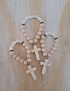 A spin on my original and popular finger rosary, these now come personalized by popular demand and available in rose gold, gold, bronze silver and gunmetal  If you have an special requests or want a combination of metals, stones, names etc please message me.  These rosaries are bulk discounted, please select qty from drop down menu. Personalized Cross Rosary Bracelet For Baptism, Customizable White Rosary Bracelet As A Gift, Customizable White Rosary Bracelet As Gift, Customizable White Rosary Bracelet Gift, Personalized Spiritual Rosary Gift, Spiritual Cross Rosary Bracelet For Baptism, Personalized Adjustable Rosary With Round Beads, White Cross Jewelry For Personalized Gift, White Cross-shaped Jewelry For Personalized Gift