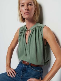 Speaking of summer essentials... It's the flowy tank of the season. Featuring a front keyhole cutout, adjustable tie, and an airy, draped fit that's built for breezes. (This one comes in Sea Spray.) | Women's Via Tank Top in Sea Spray | Ethical Essentials Sleeveless Top With Drawstring Tie For Vacation, Green Tie Neck Top For Summer, Summer Daywear Tops With Tie Neck, Summer Tie Neck Tops For Daywear, Sleeveless Tops With Drawstring Tie, Casual Tie Neck Tops For Summer, Flowy Sleeveless Tops For Daywear, Flowy Tie Neck Top For Summer, Flowy Sleeveless Breezy Top