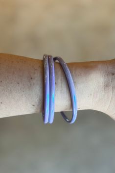 Add a pop of color to your arm candy with a set of these bright, fun iridescent bangle bracelets. Comes in a set of three. 3” diameter. Pop Of Color, Bangle Set, Arm Candy, Bangle Bracelets, Color Pop, Bangles, Candy, Orange, Purple