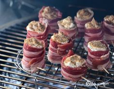 meat and cheese appetizers are cooking on the bbq grill with toothpicks