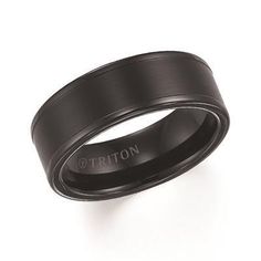 a black ring with the word triton engraved on it