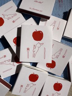 red and white cards with images of food on them are arranged in the shape of an apple